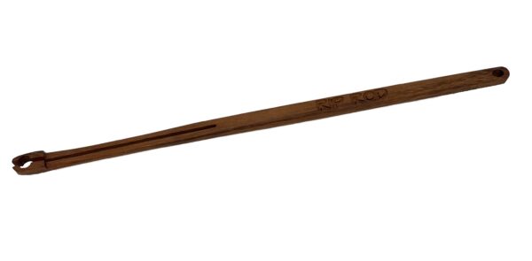 A Tigerwood tool with a long narrow handle, slotted forked end, engraved text, and a hanging hole at the other end.